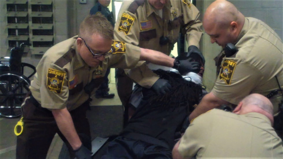 'Please don’t kill me': Extremely disturbing video shows officer brutalizing a restrained black man