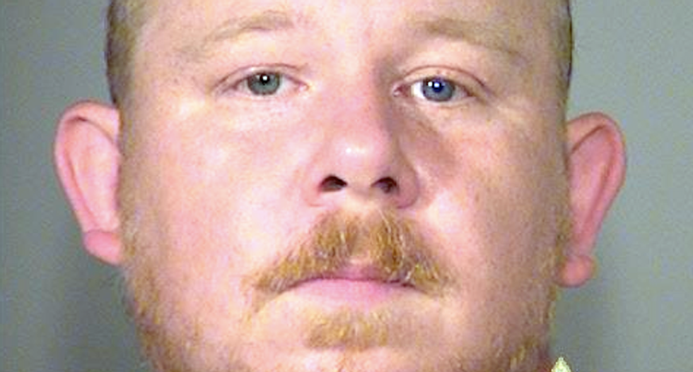 Cop-stalking gun nut busted with truckload of weapons outside Oregon police station