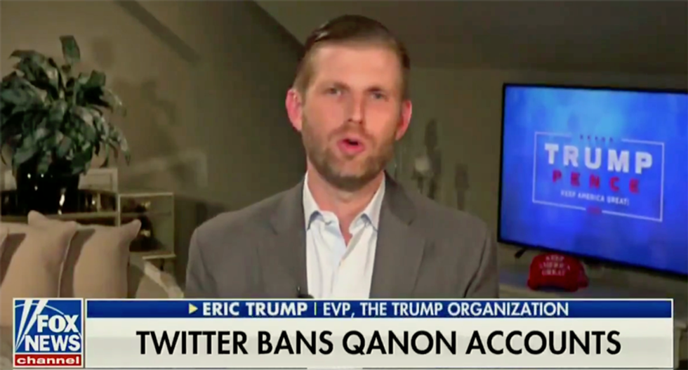 Fox News anchor praises QAnon conspiracy theorists for 'a lot of great stuff' during Eric Trump appearance