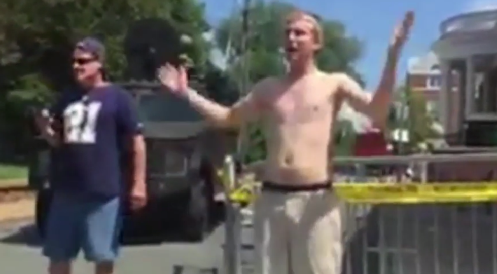 WATCH: Panicked white supremacist renounces beliefs the second he's confronted by masked demonstrator