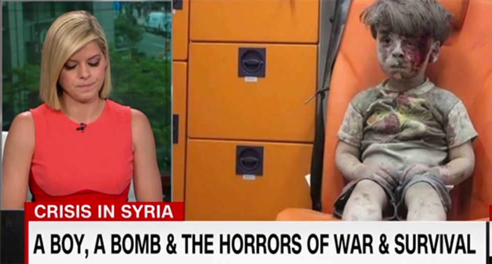 CNN’s Kate Bolduan struggles to hold back tears while covering boy who barely survived Syria bombing