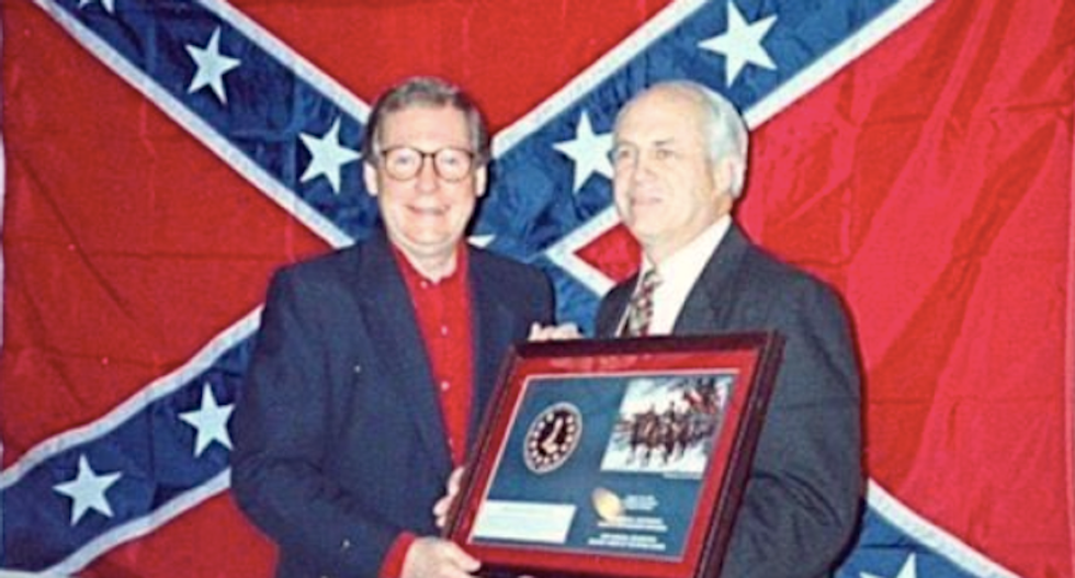 Mitch McConnell continues to be haunted by this Confederate flag photo – but he says he has no regrets