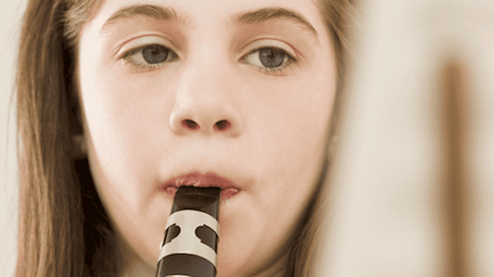 Students back Michigan band teacher suspended for duct-taping girl's ankles to chair