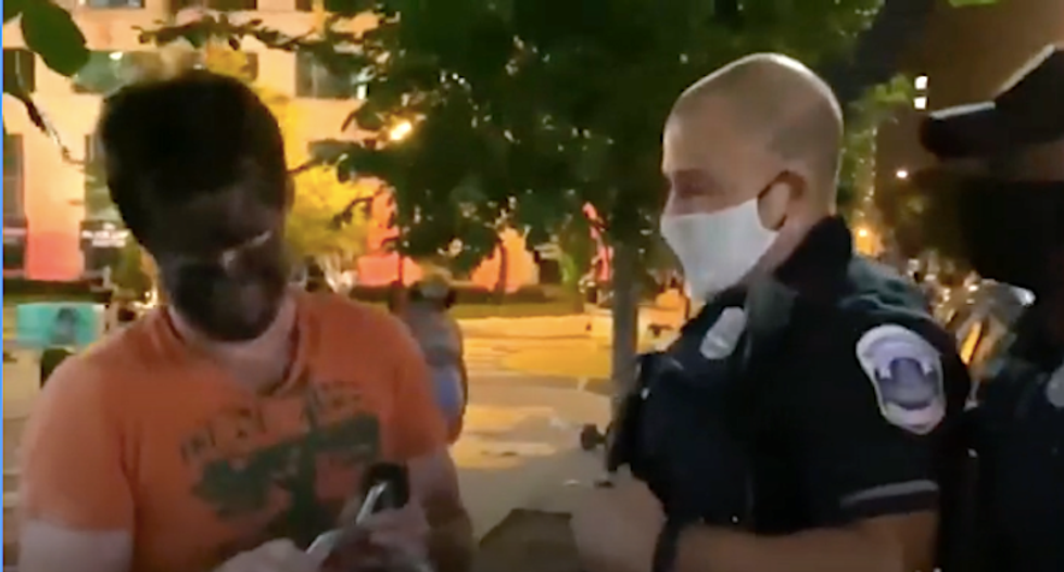 WATCH: Man shows up to White House protest wearing blackface – and gets punched in the head