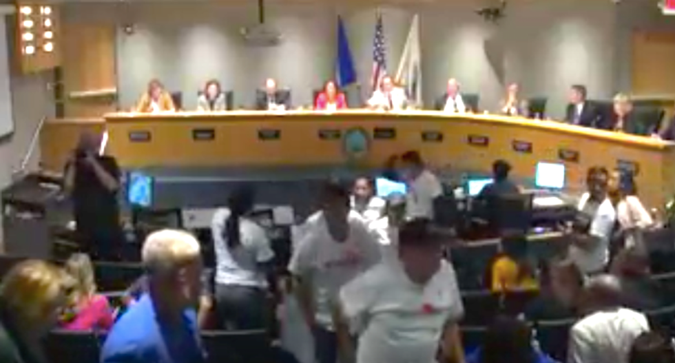 'You suck!': Virginia county meeting dissolves in chaos over proposal to rename Confederate monuments