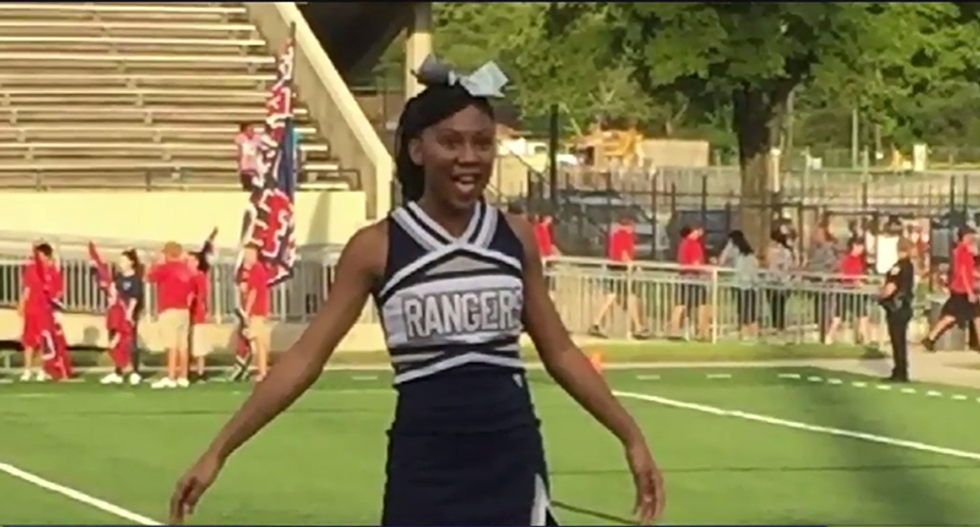 Texas coach threatens to ban squad’s only black cheerleader over her braids