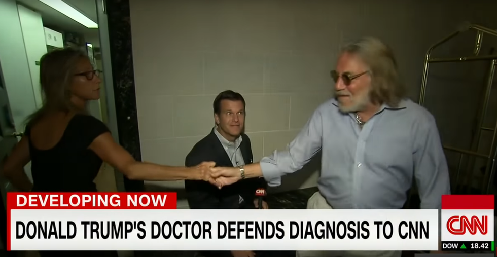WATCH: Trump doctor's wife threatens to call the cops on CNN during interview