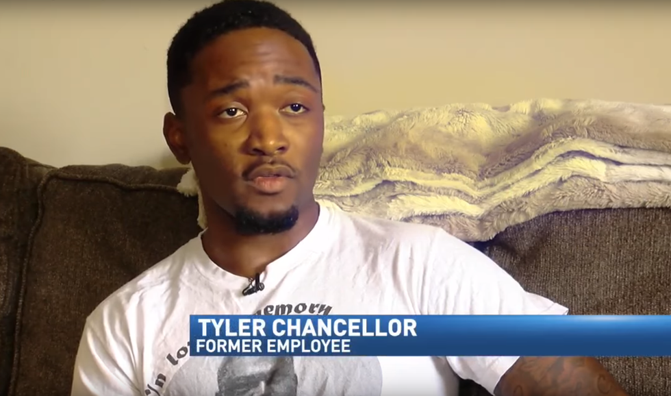 Tennessee man says he was fired after being spotted sitting during national anthem at weekend event