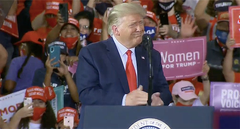 Trump leads Nevada crowd in chant to 'lock-up' Barack Obama: 'Let's see what happens'