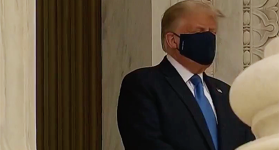 Trump met with boos and chants of 'vote him out' outside the Supreme Court