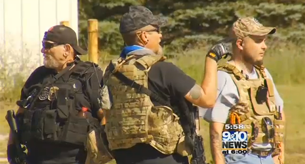 Left- and right-wing militias face off in Michigan after official calls for the murder of 'every last Muslim'