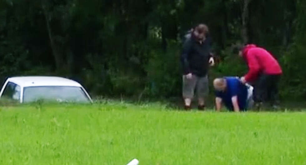 WATCH: CNN reporter drops mic to save man from truck being swept away by Harvey waters