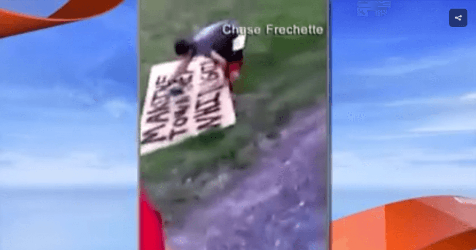 WATCH: Angry neighbor destroys Trump fan’s ‘Make the township white again’ sign with a chainsaw