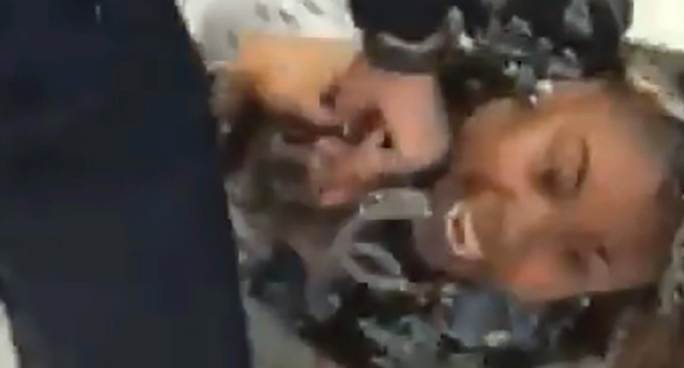 ‘They’re hurting my son!’ NYC cops yank baby from mother’s arms during incident at food stamp office