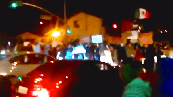 Protest over CA police shootings turns violent, hospitalizing cop trying to help slain teen