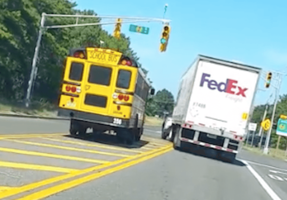 WATCH: School bus and FedEx truck nearly collide in shocking road rage video