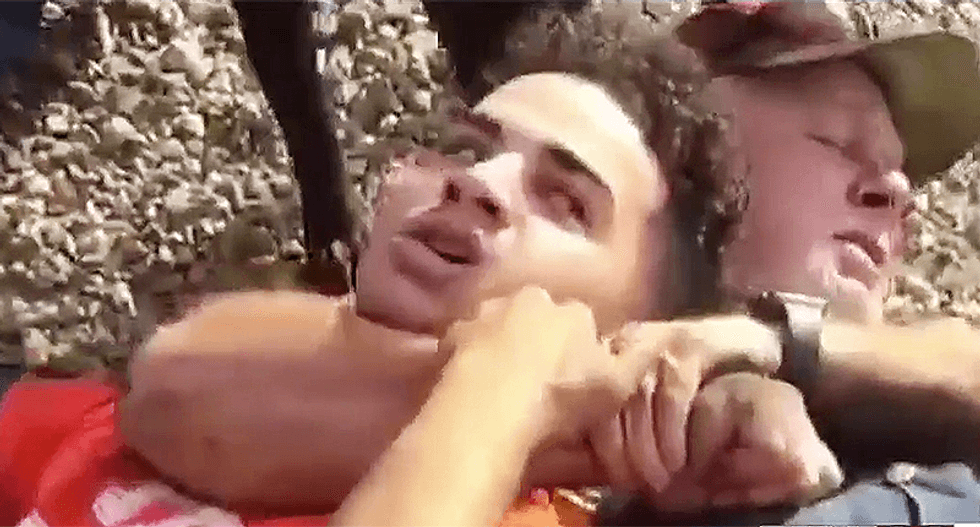 WATCH: Police handcuff black honor student after he gets attacked at towing company