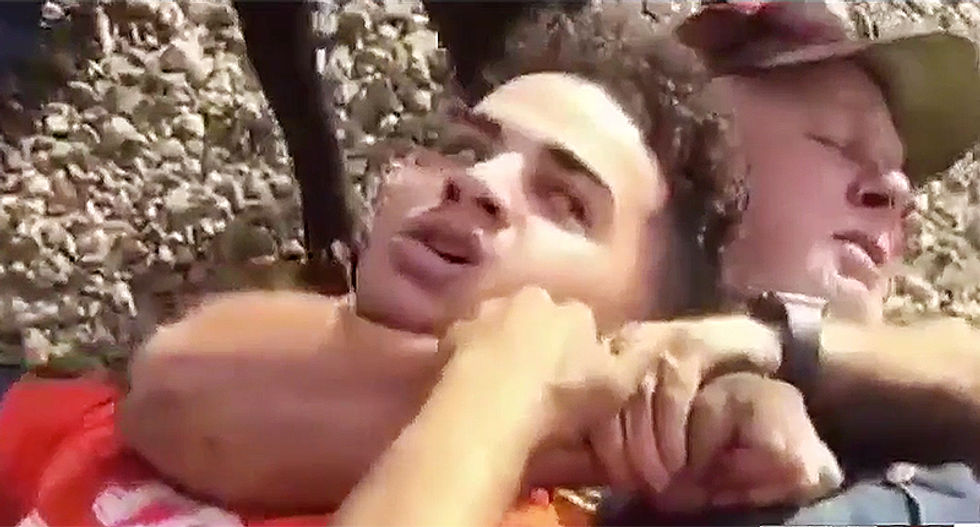 WATCH: Police handcuff black honor student after he gets attacked at towing company