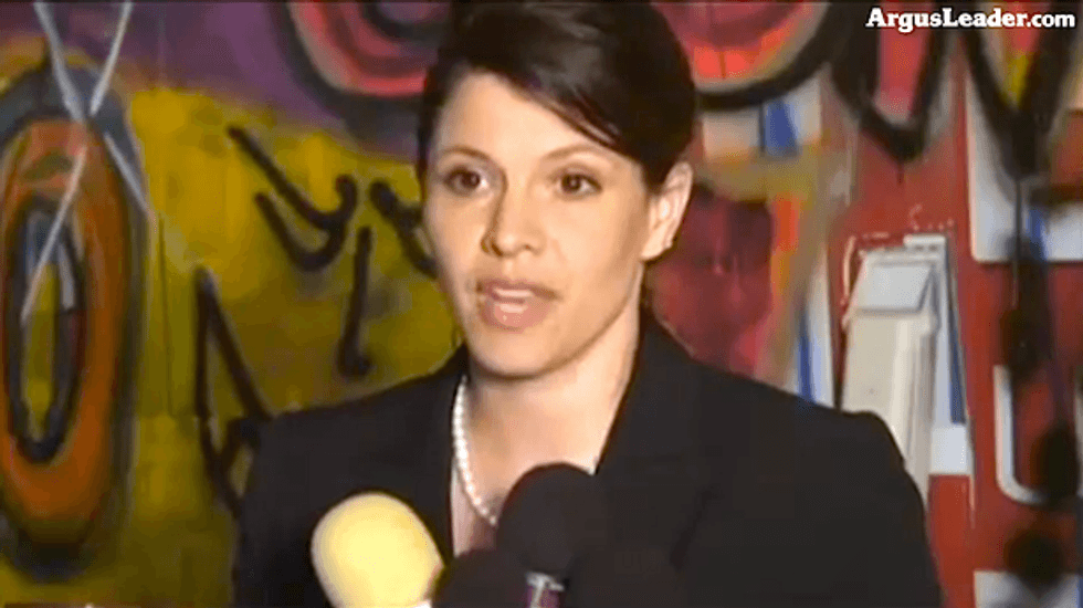 GOP candidate rips 'supposedly tolerant liberals' in room covered by sexist graffiti