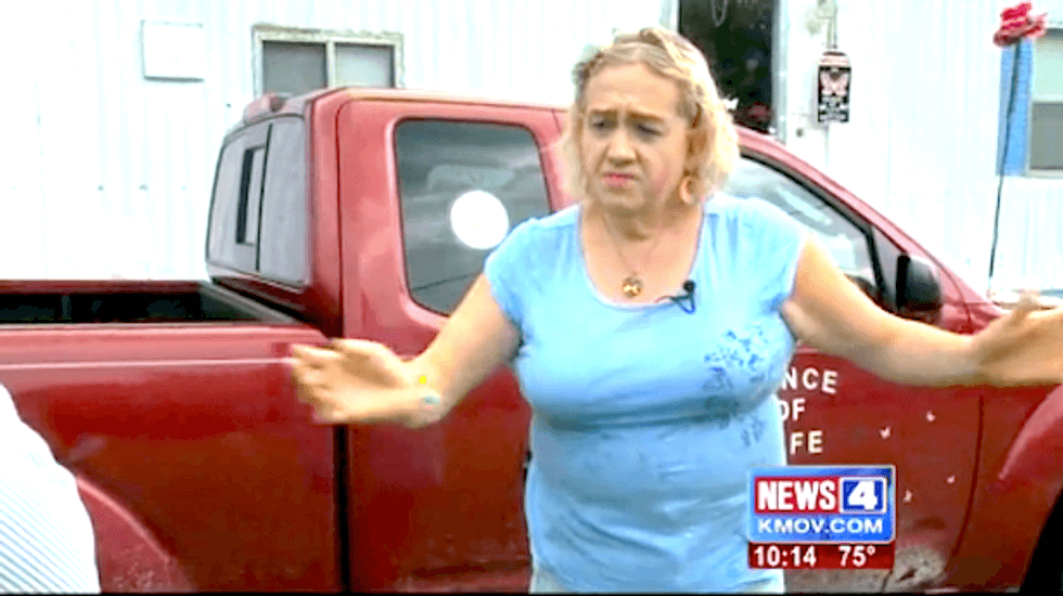 Comically bad dancer blames racism after she's pulled from dance floor at African festival