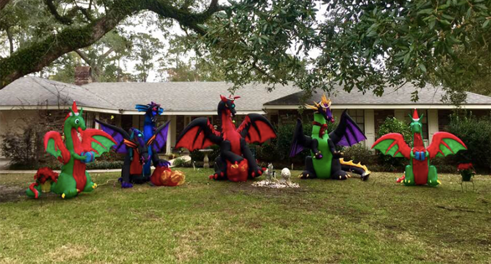 'Demonic cult!': Louisiana neighbor goes off when woman puts Santa hats on dragons for Christmas display