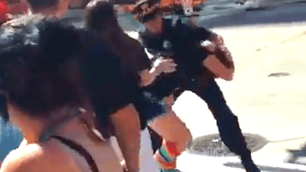 WATCH: Pittsburgh cop grabs woman by hair, punches her in gut during PrideFest parade