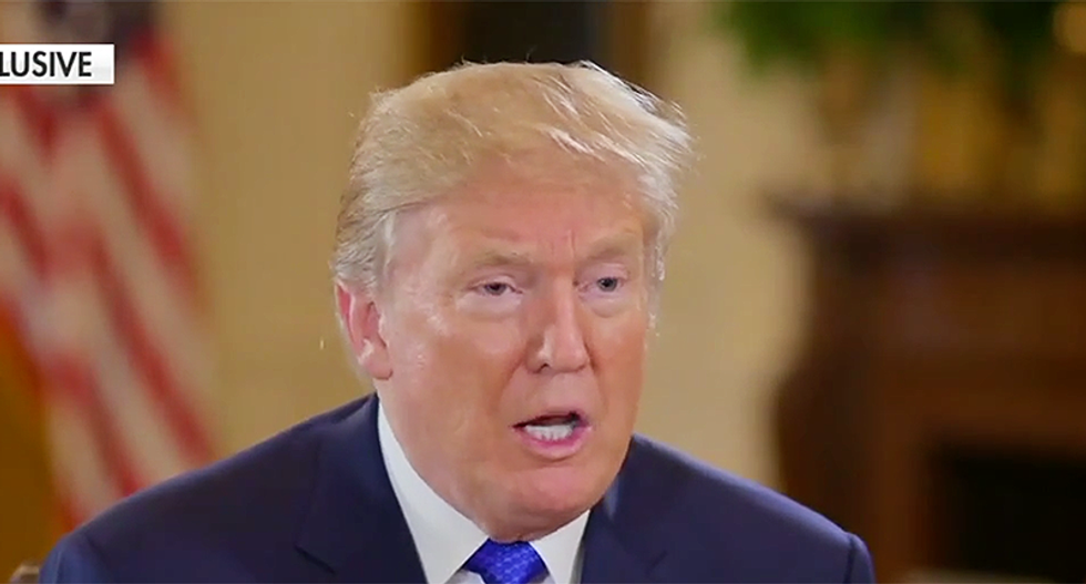 Aides trick Trump into reading with a ‘book’ that’s basically just photos of cable news chyrons: report