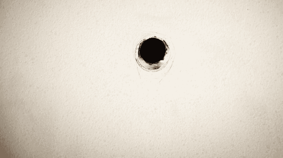 Man falls asleep watching gun videos, shoots AR-15 into neighbor's apartment