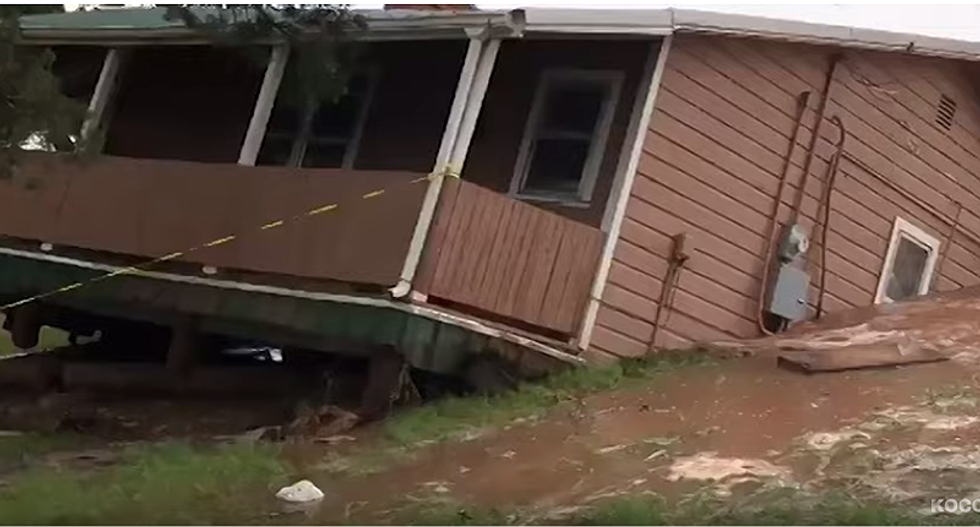 WATCH: House falls into the river as Oklahoma flood waters rise