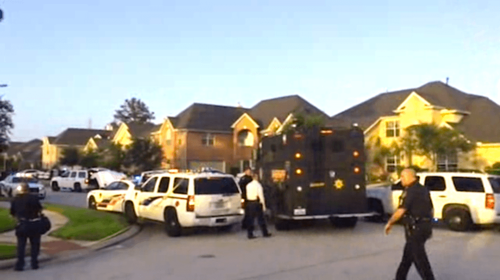 Houston man who fatally shot six -- including four kids -- surrenders after suburban standoff