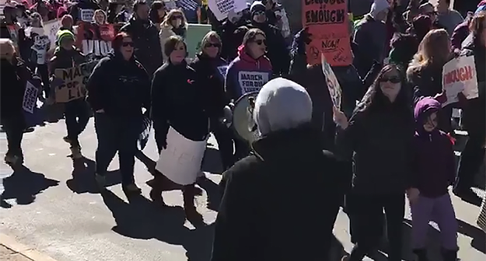 WATCH: #MarchForOurLives counter-protester gets shut down by marchers chanting 'USA not NRA'