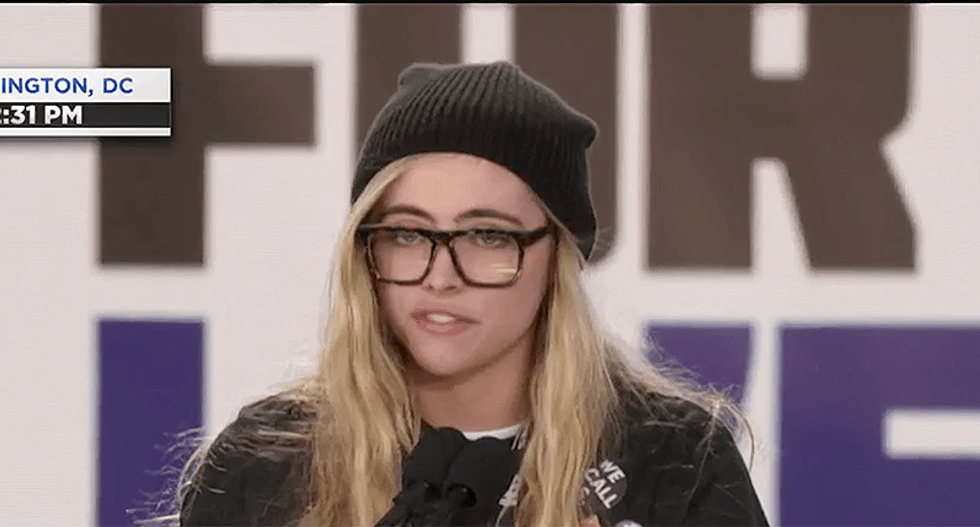 Parkland student Delaney Tarr speaks through tears as 100,000-person crowd chants 'vote them out'