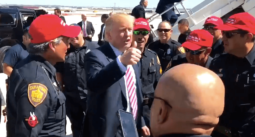 San Antonio cops face discipline for wearing Trump hats to greet candidate while on duty