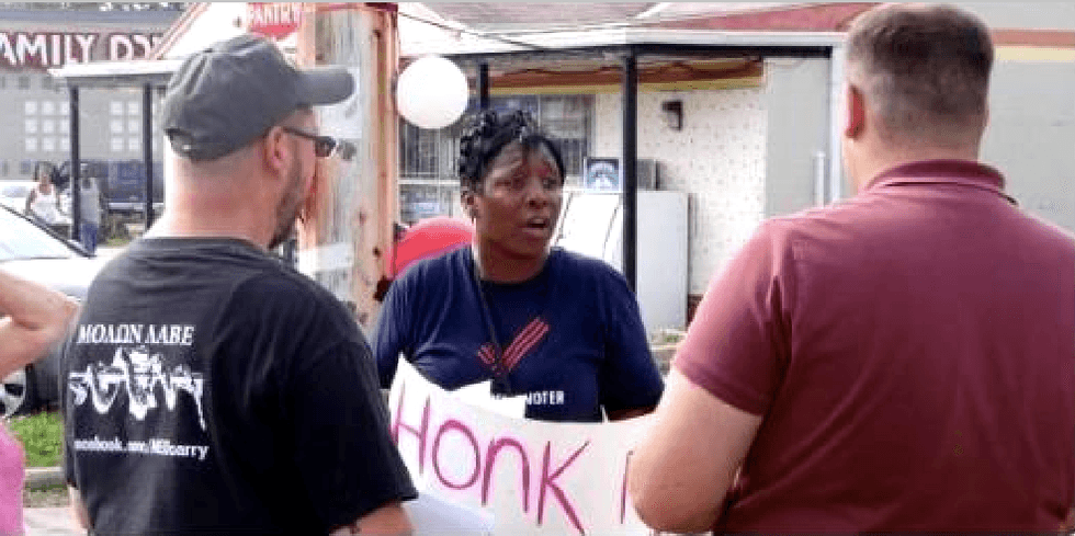 Armed Open Carry activists crash Ohio anti-gun violence rally and harass protesters