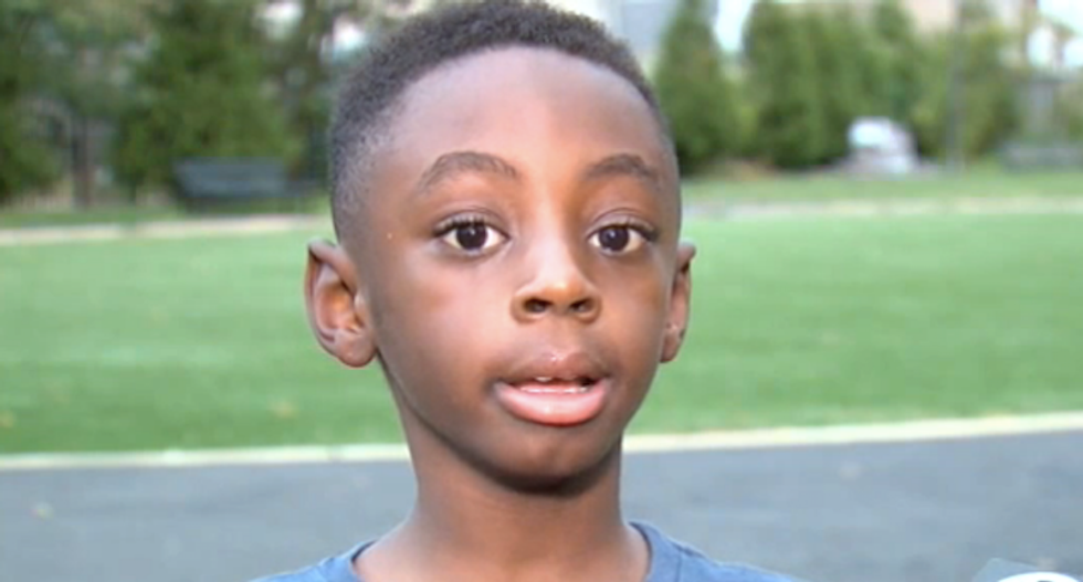 WATCH: Parent slugs 7-year-old boy in the gut for no reason in school hallway