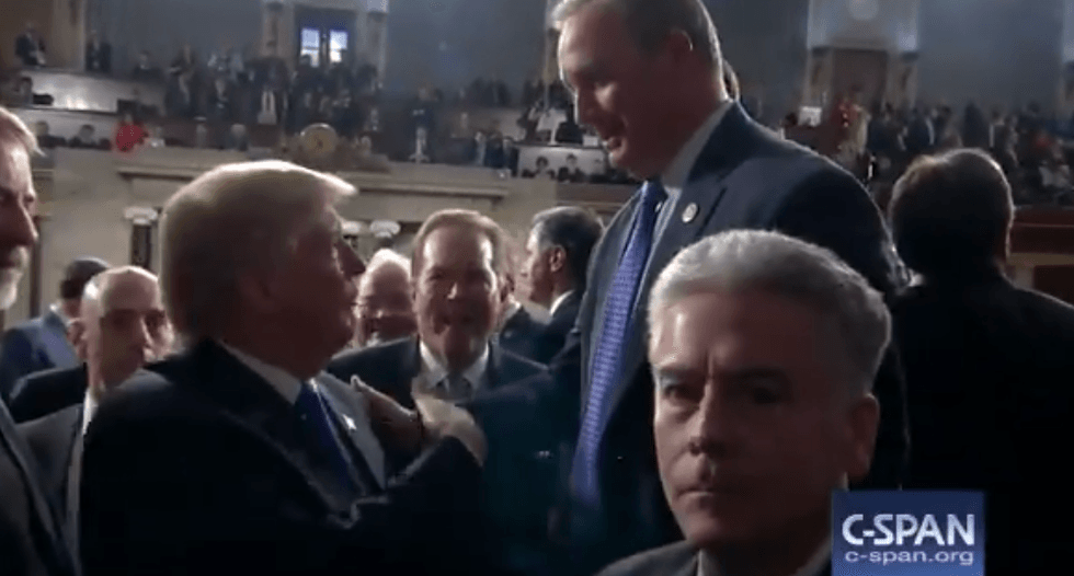 '100 percent': Trump caught on hot mic guaranteeing GOP rep he'll release Nunes memo