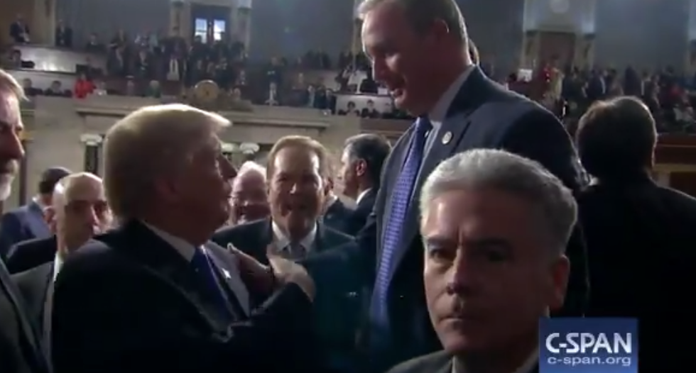 '100 percent': Trump caught on hot mic guaranteeing GOP rep he'll release Nunes memo