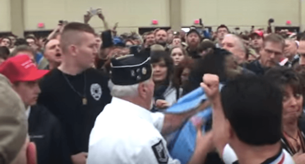 Elderly veteran embarrassed after shoving black protester at Trump rally — but insists he’s ‘not racist’