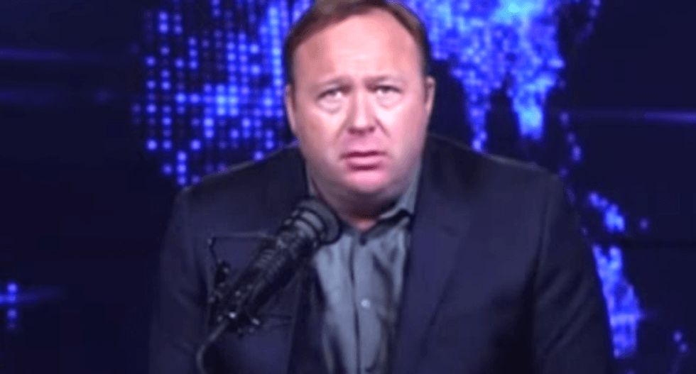 Conspiracy theorist Alex Jones loses child custody battle