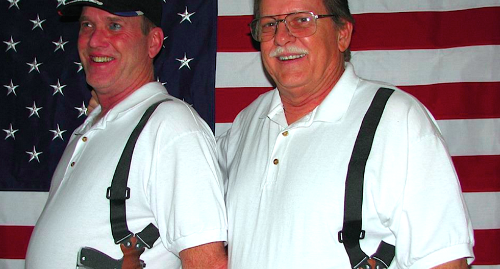 Realistic 'open carry' T-shirts intended to 'drive anti-gun nuts crazy' -- but could put wearers at grave risk