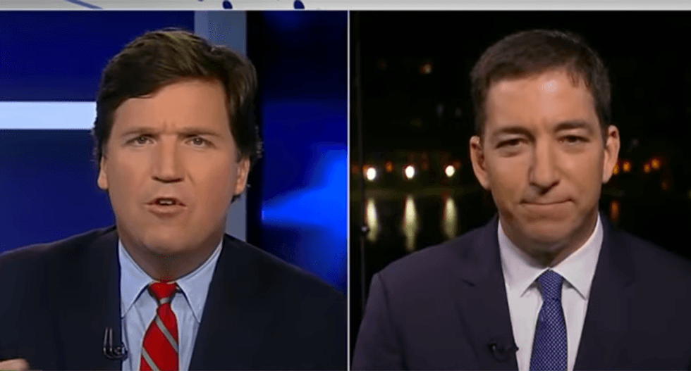 ‘Beyond a parody’: Glenn Greenwald scorched for Fox News interview with Tucker Carlson