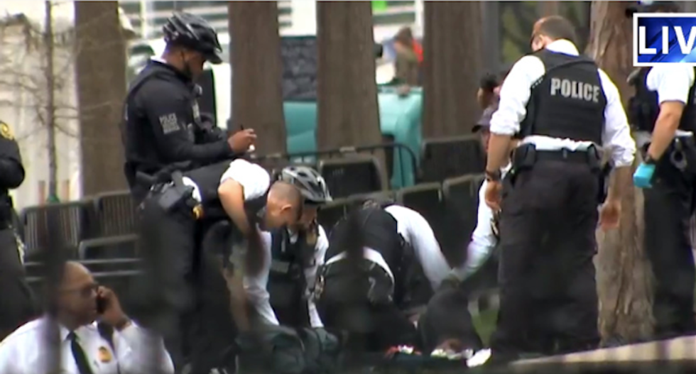 Frantic activity outside the White House after man sets himself on fire -- and Secret Service finds 'suspicious packages'