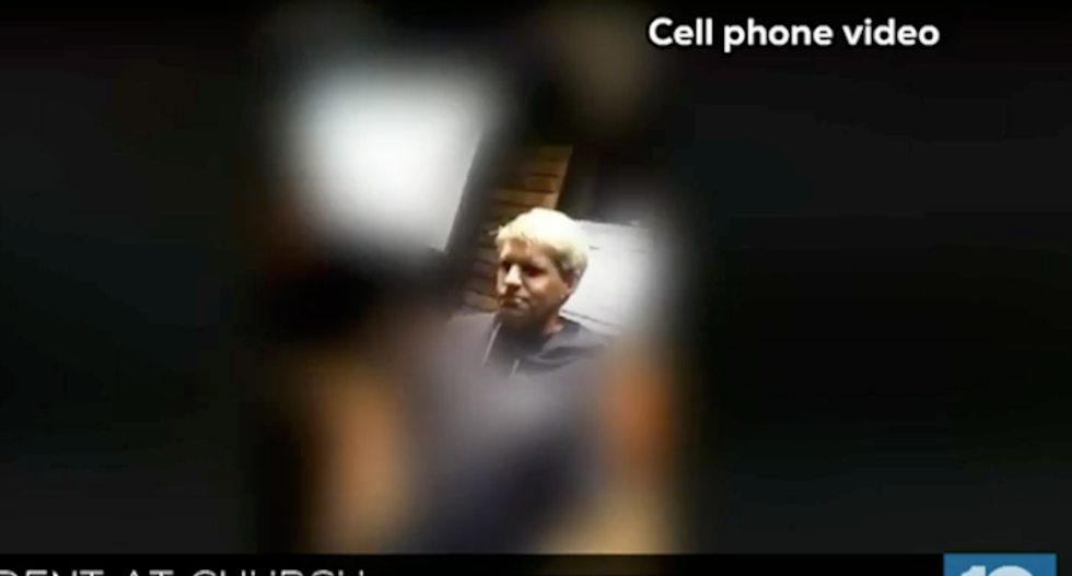 Parents horrified after bizarre video shows Ohio pastor encouraging kids to spit on him and stab him