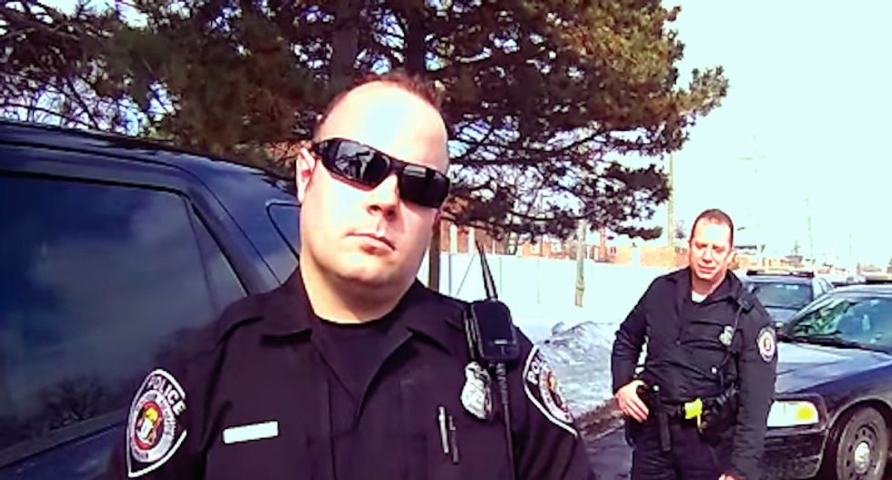 Watch this open-carry activist taunt cops outside a school: 'I'm talking to you, tough guy'
