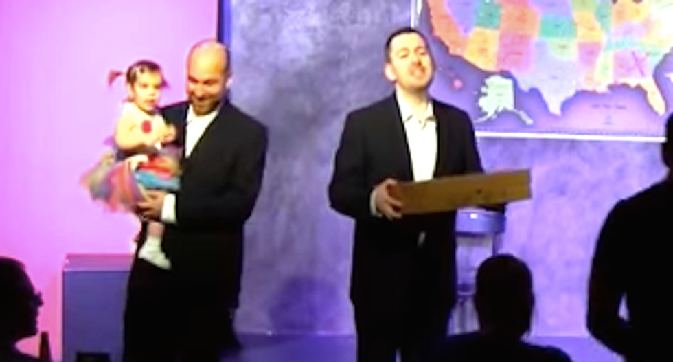 WATCH: Gay couple tricks anti-LGBT Indiana pizzeria into catering their wedding celebration