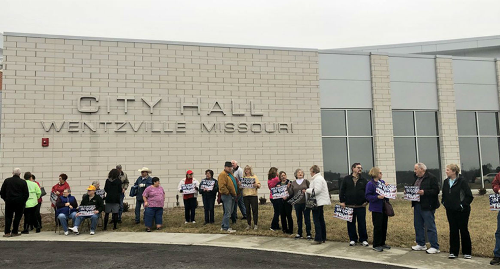 An 'In God We Trust' sign is causing serious uproar in one town