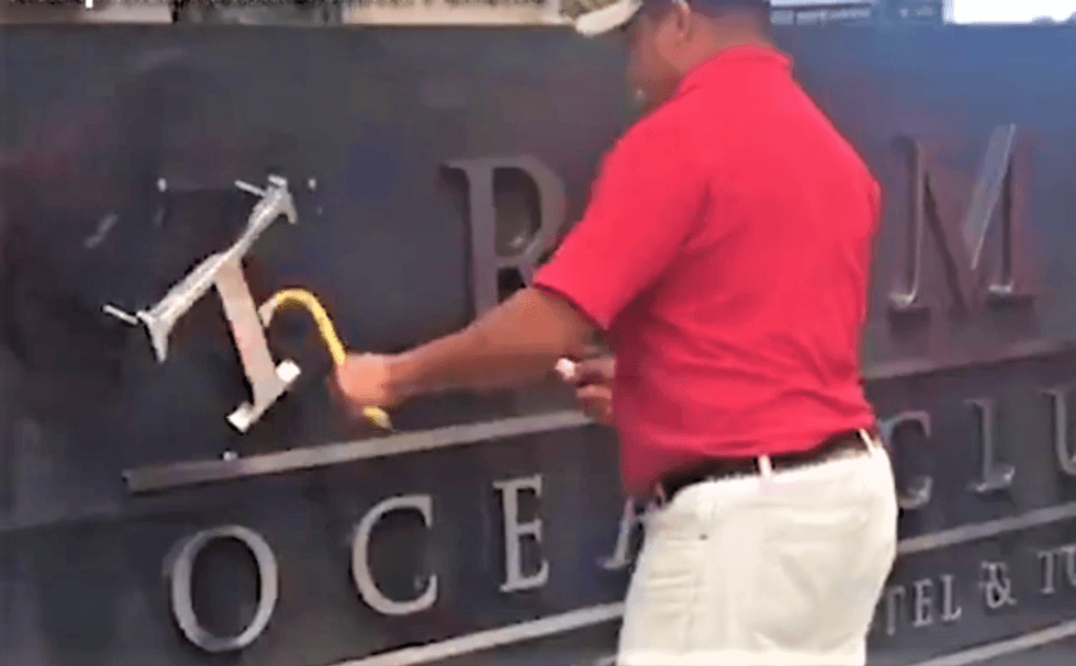 Humiliation: Watch Trump's name get torn off Panama hotel amid feud with owners