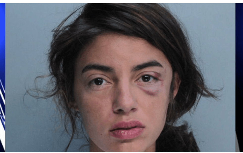 Miami Beach cop suspended for punching handcuffed model after new video emerges