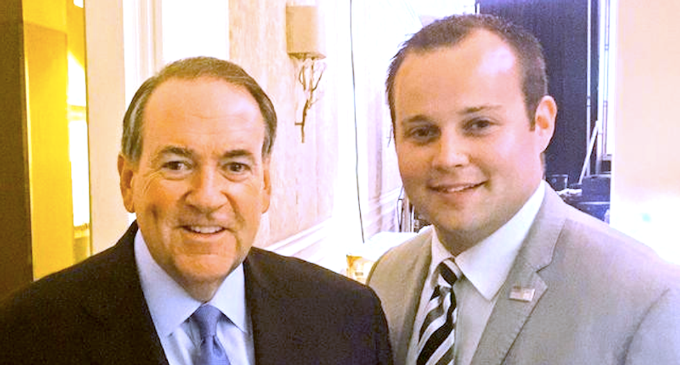 Mike Huckabee has a brand new child molester problem -- the co-author of his books