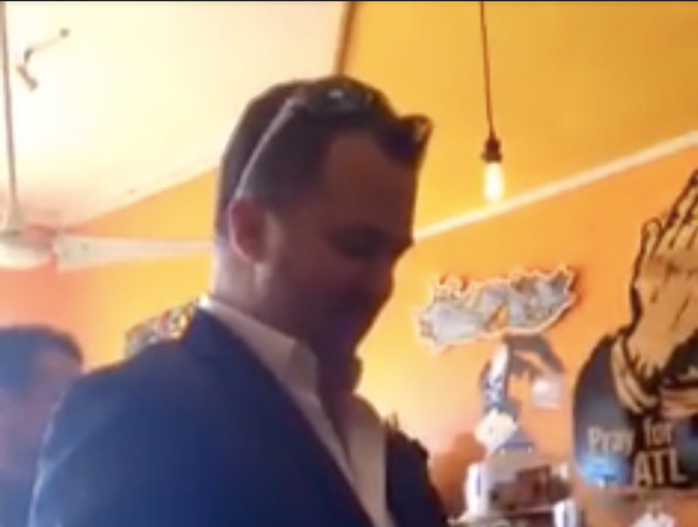 'I'm not afraid of you': Muslim woman films harasser and posts video of coffee shop showdown